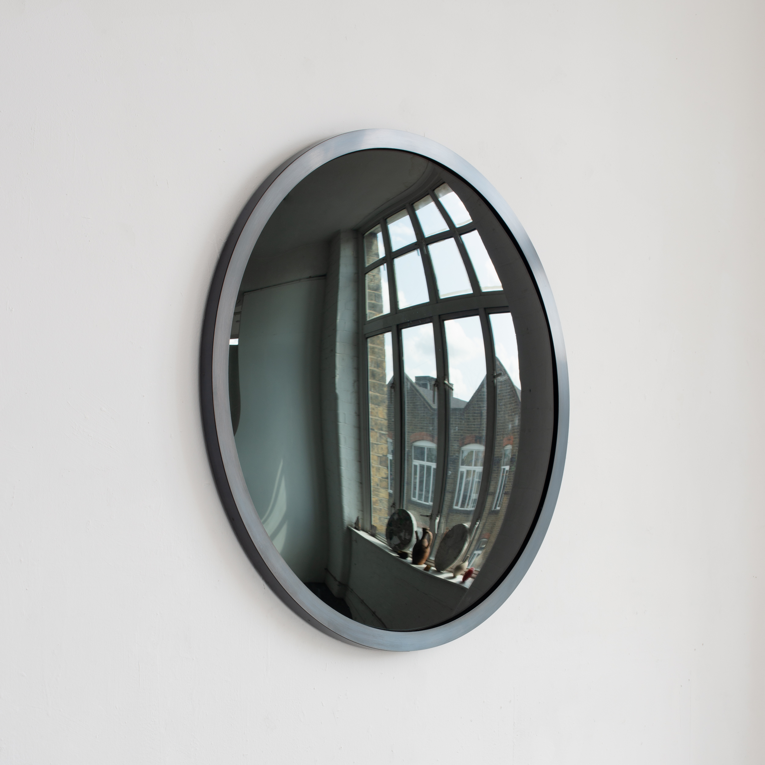 Black Tinted Convex Mirror with a Blackened Metal Frame