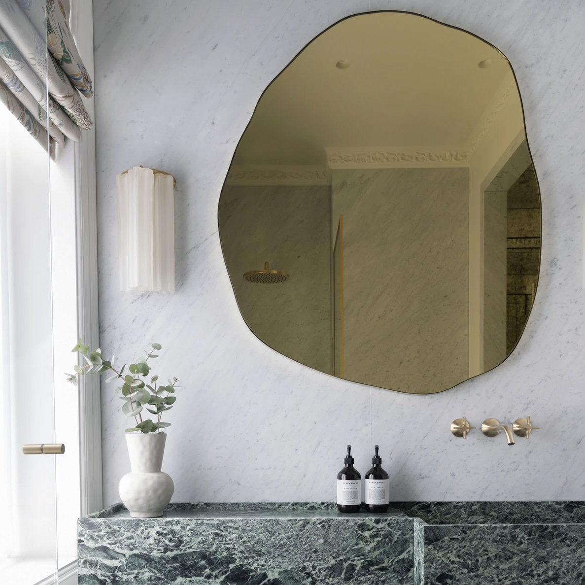 Ergon™ Freeform Organic Mirror with a Gold Tint and a Brushed Brass Frame