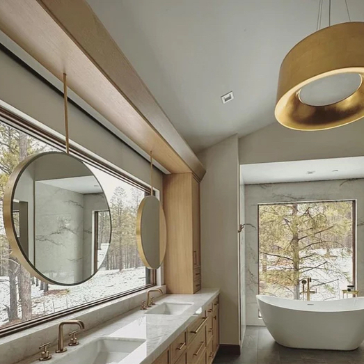 Ceiling Suspended Orbis™ front illuminated bathroom mirrors