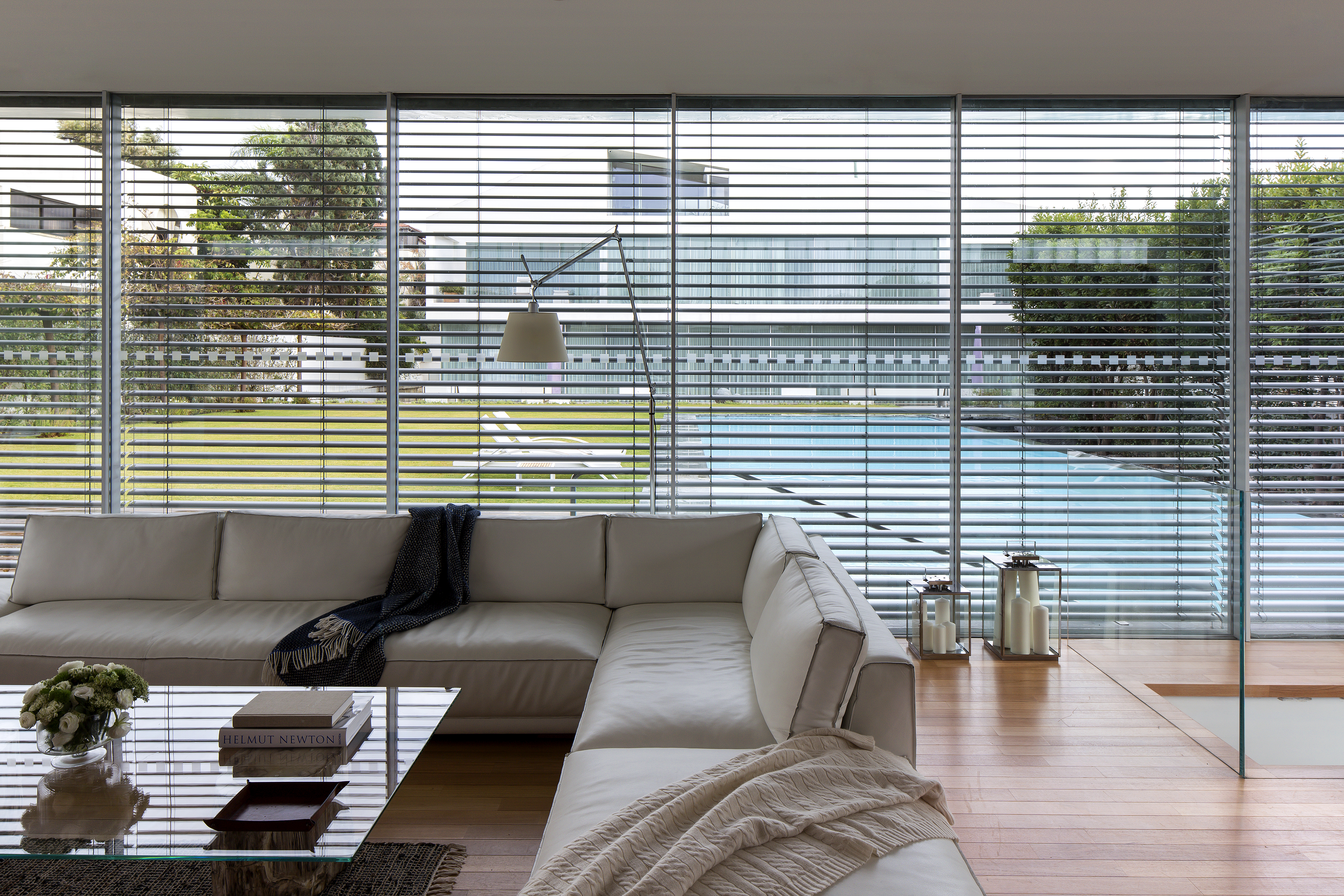 View to the pool over the bespoke made modular sofa