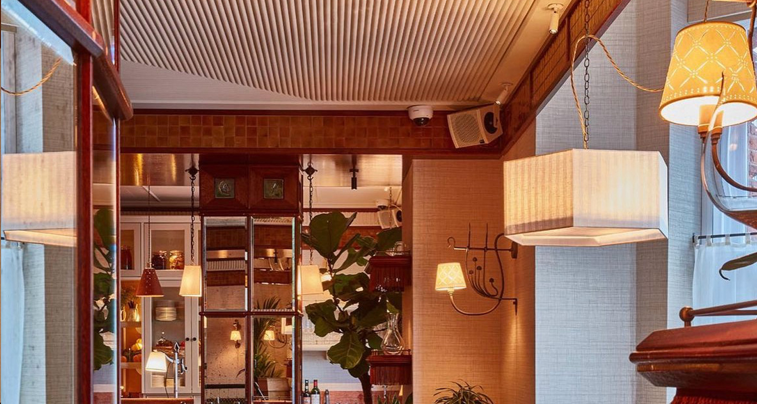 A restaurant view featuring the hexagon silk striped pendant lampshade and 