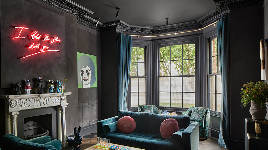 Luxury games room featuring bespoke VENSTRE designer curtains in deep teal, framing traditional bay sash windows. Showcases high-end window treatments, velvet sofas, and architectural detailing, ideal for modern and classical interiors.