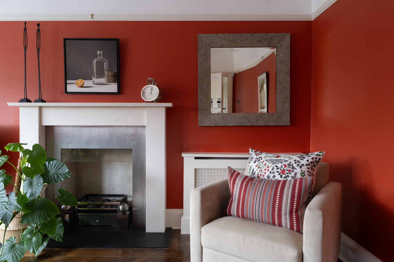 Red walls, fireplace view