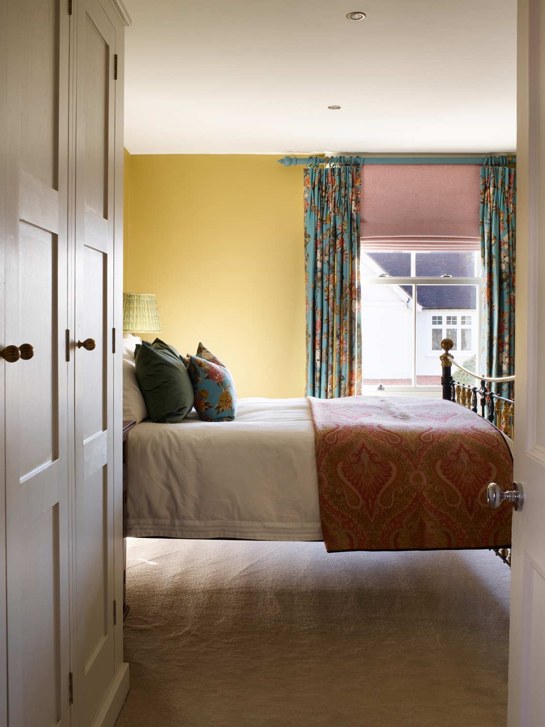 Teal curtains in bedroom