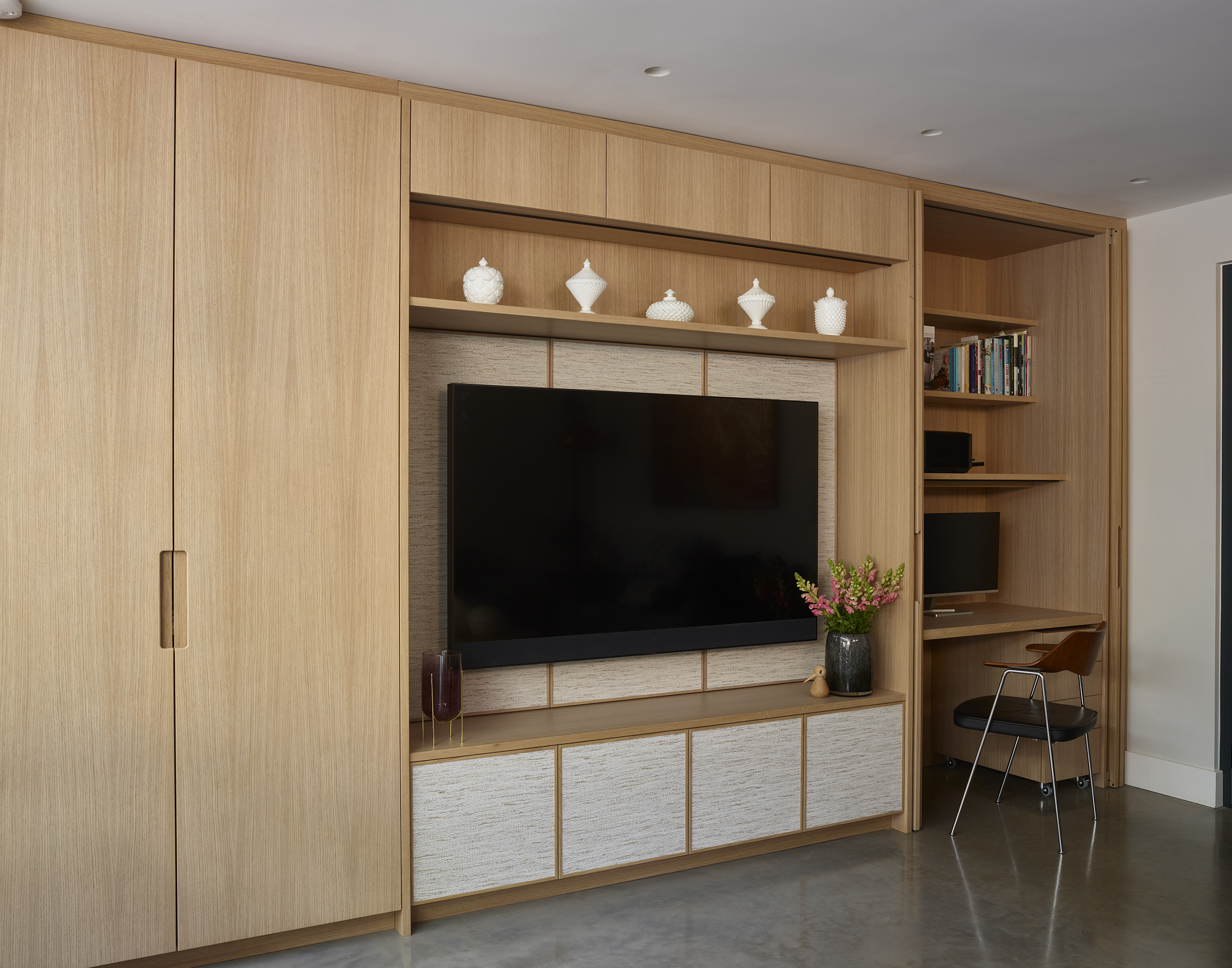 Media area with open view of concealed office