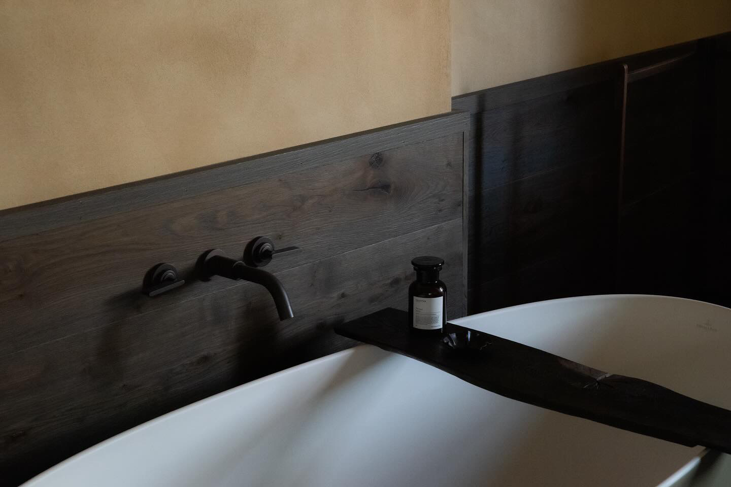 Striking solid brass bath taps featured in this luxury hotel space.