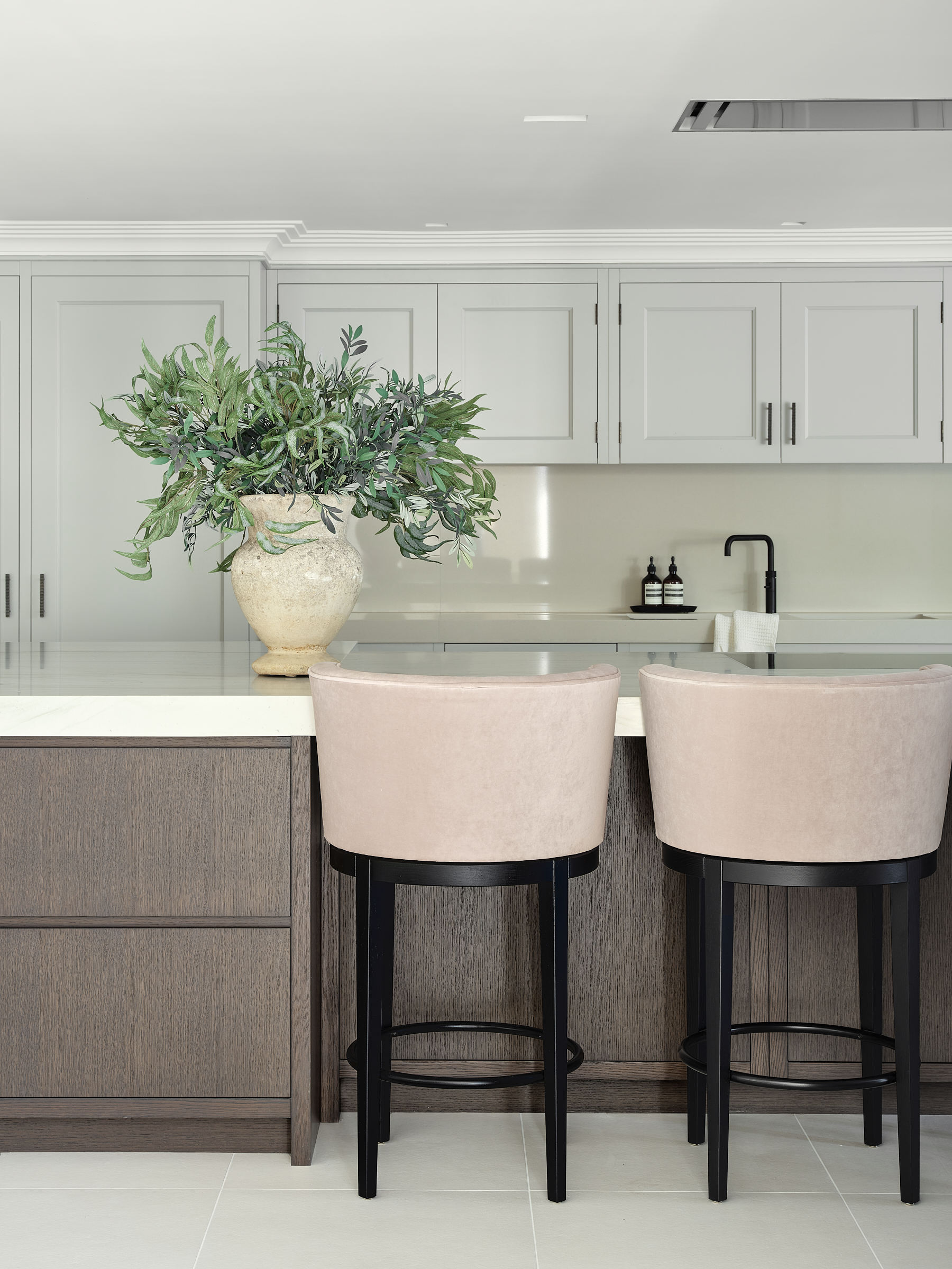 Bespoke Chamber Furniture kitchen combining timber and painted  cabinets with stone worktop in neutral palette