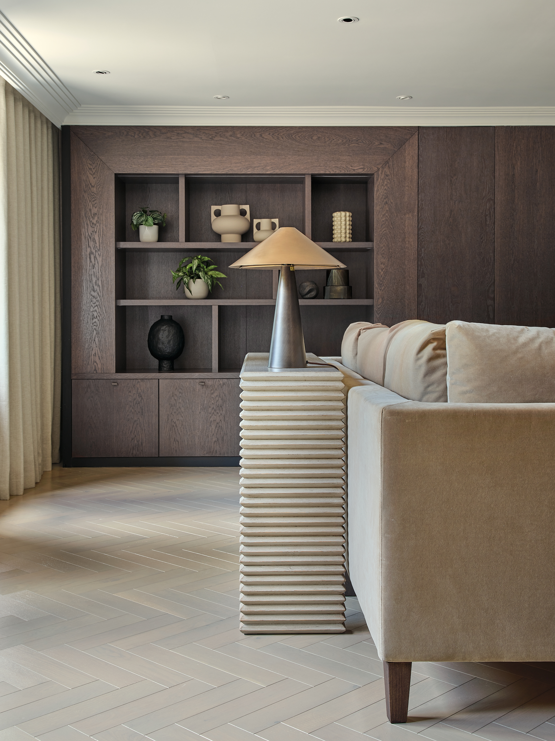 Drawing Room with Dark Timber Joinery Wall & Fireplace
