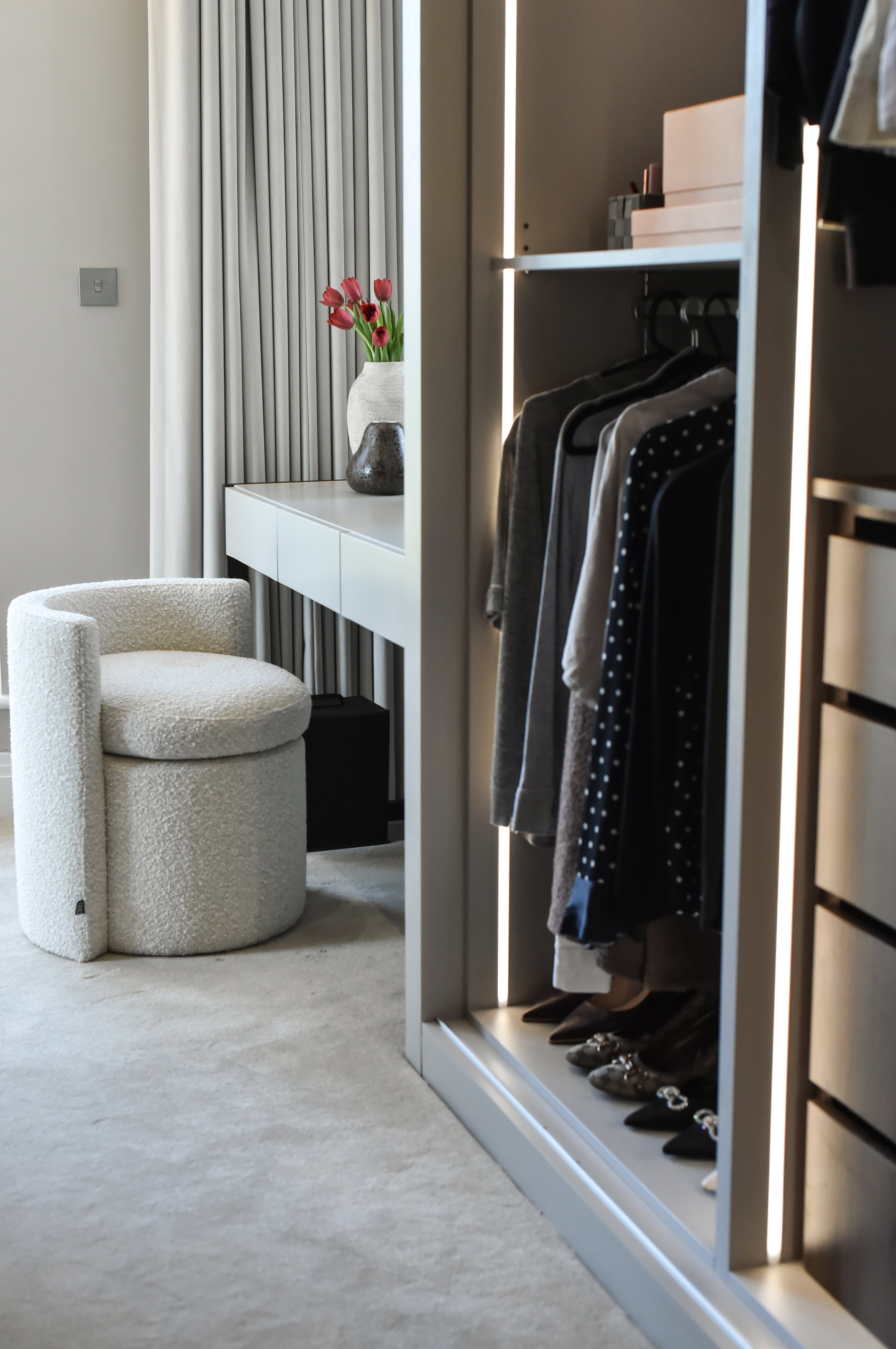 A walk-in closet was created behind the headboard partition