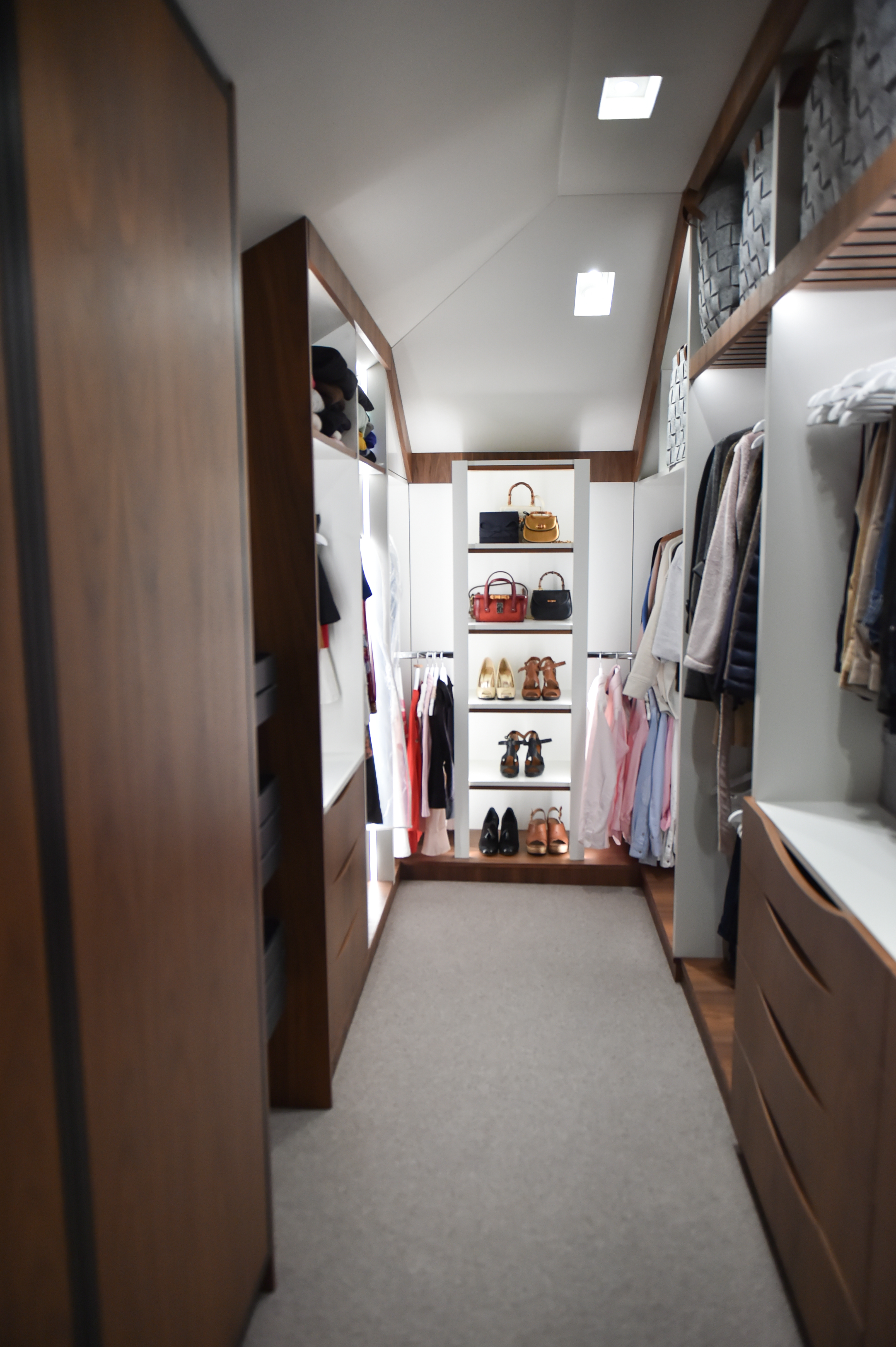 Walk-in closet behind the new partion/headboard