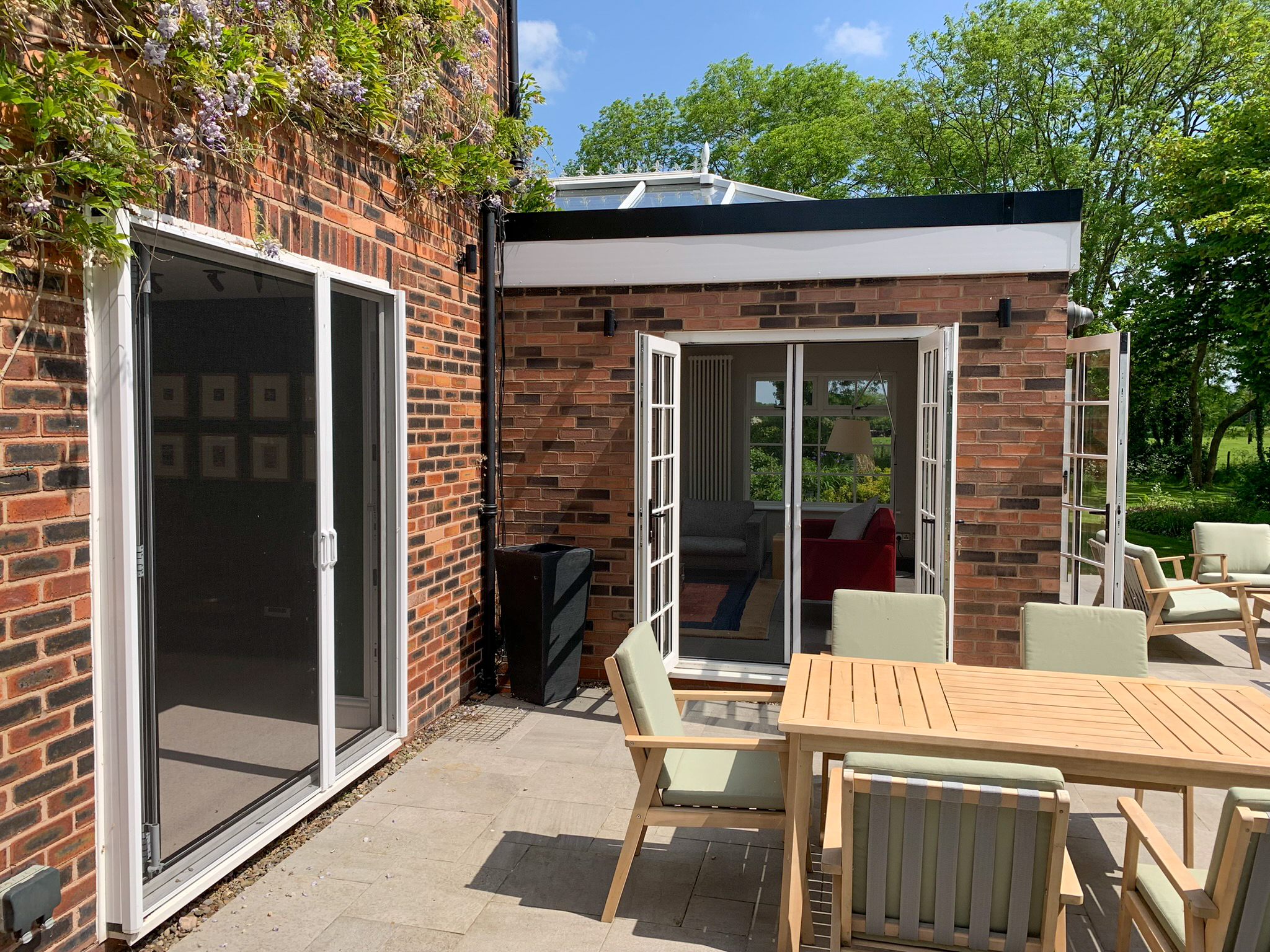 Custom-fit Phantom Screens in a modern countryside property, enhancing comfort and maintaining design integrity