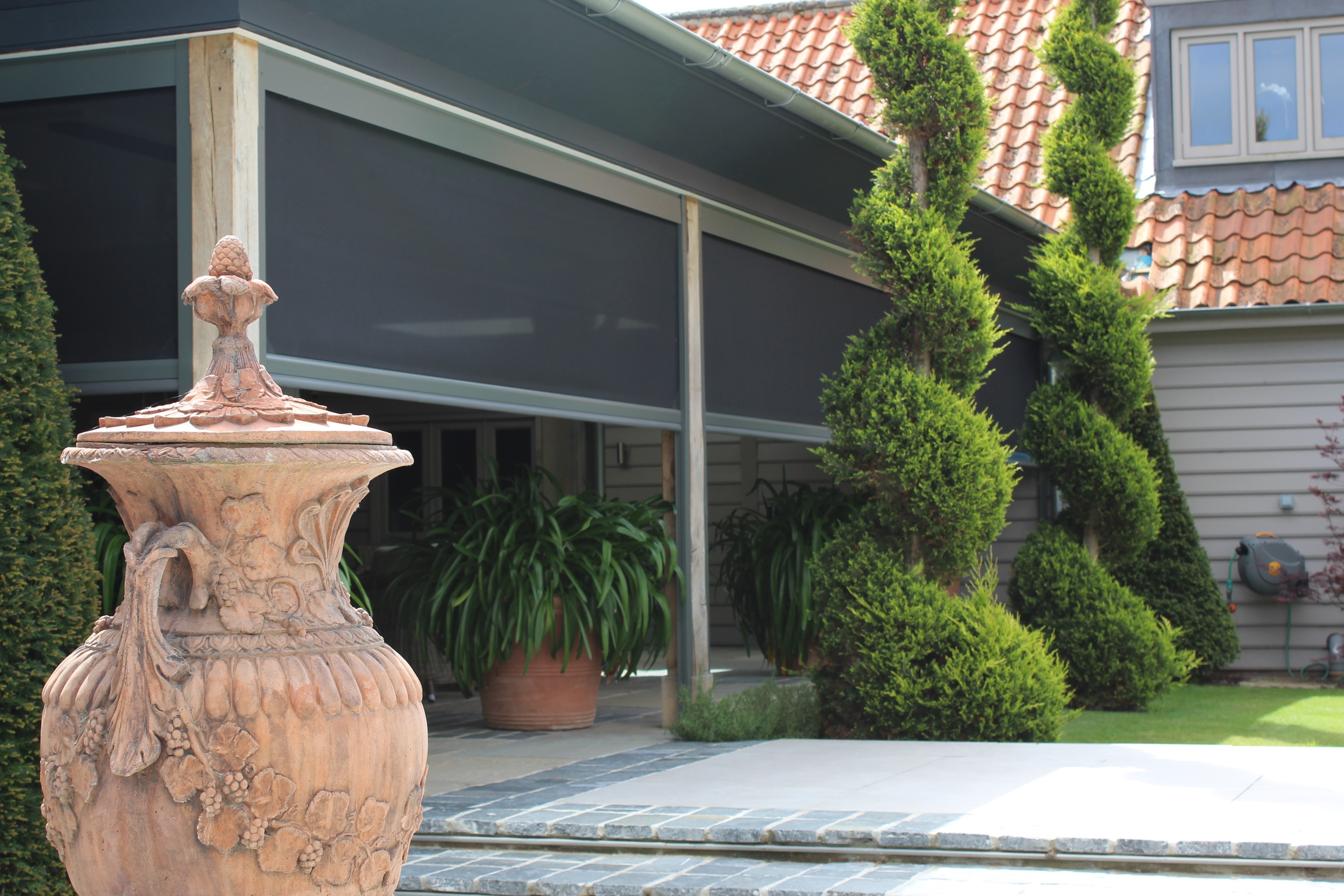 Landscaped garden and fly screen wrapped veranda