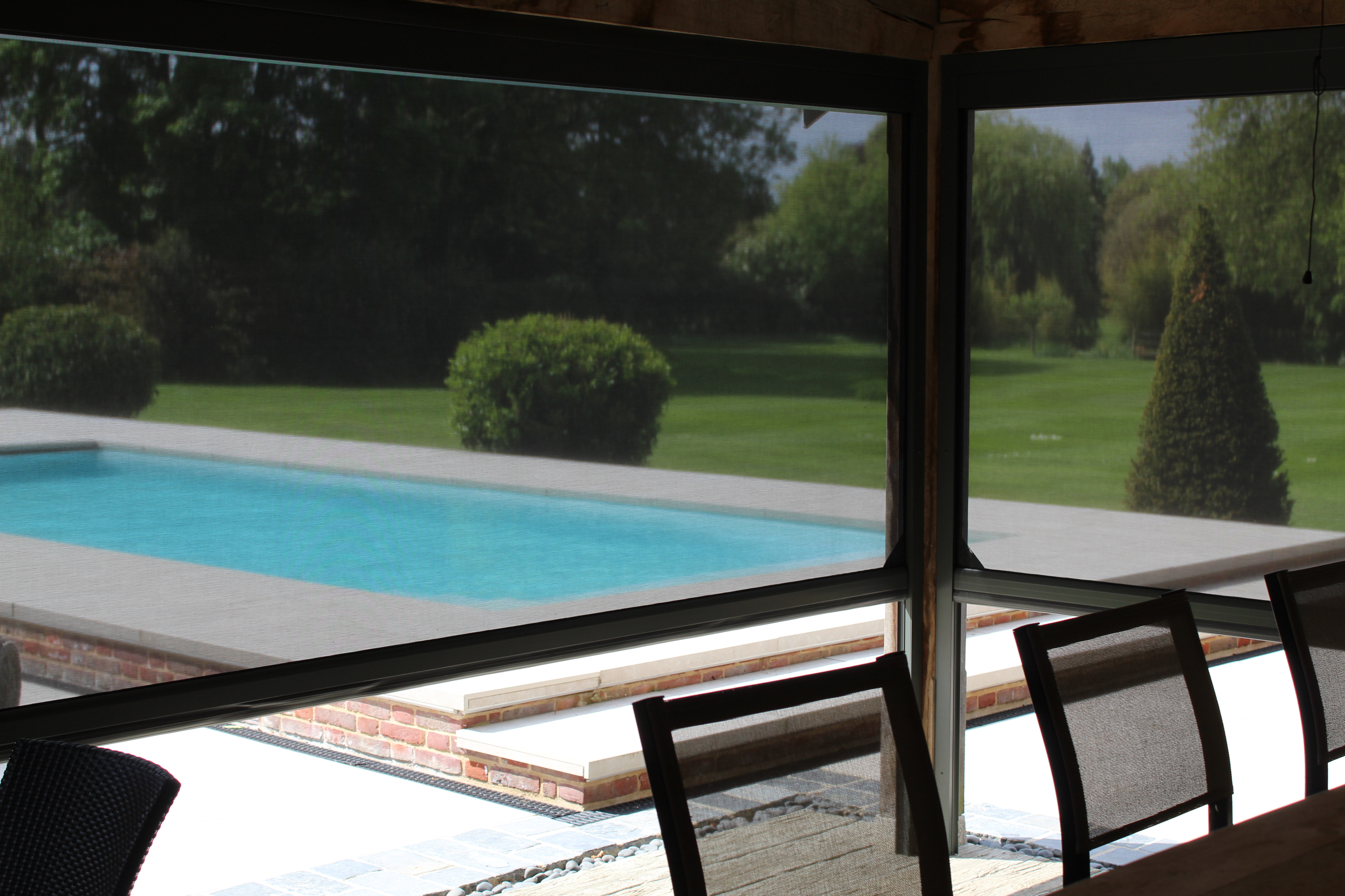 Poolside bar with power screens
