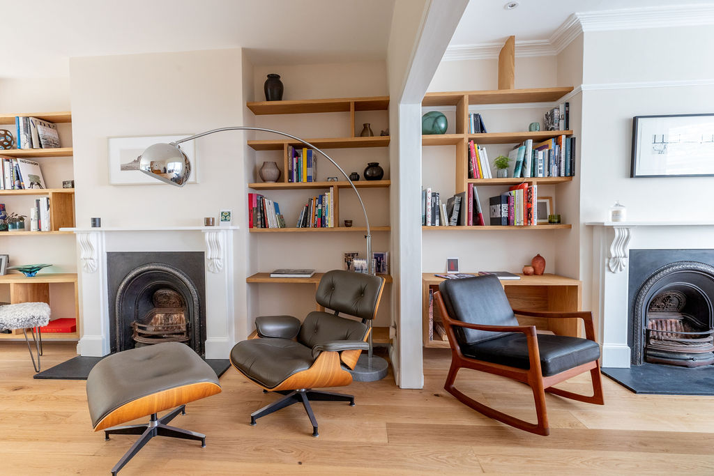 Open plan lounge with built in joinery and design classic leather furniture 