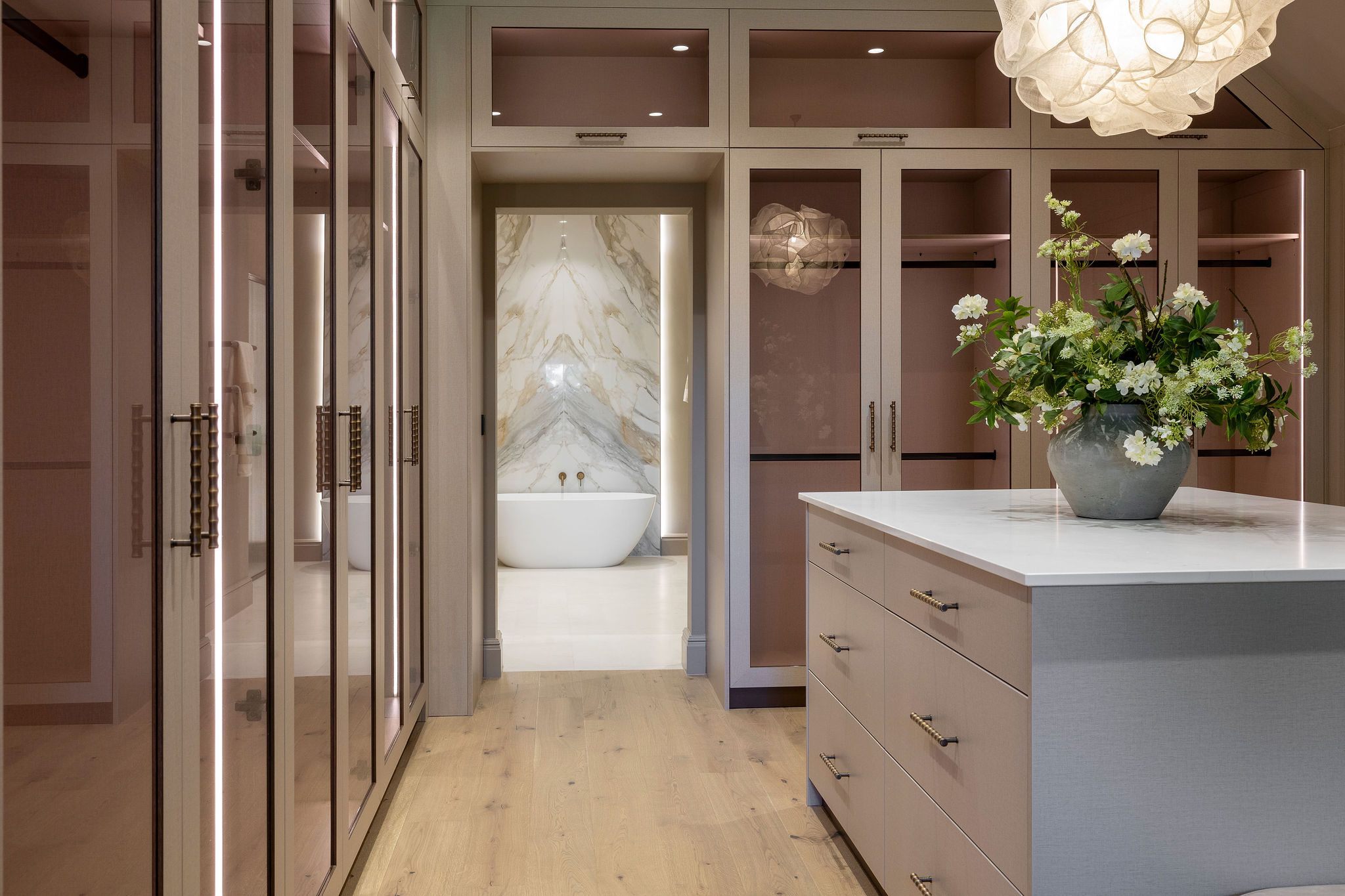 The dressing area offers plentiful storage whilst also being a stylish space in its own right.