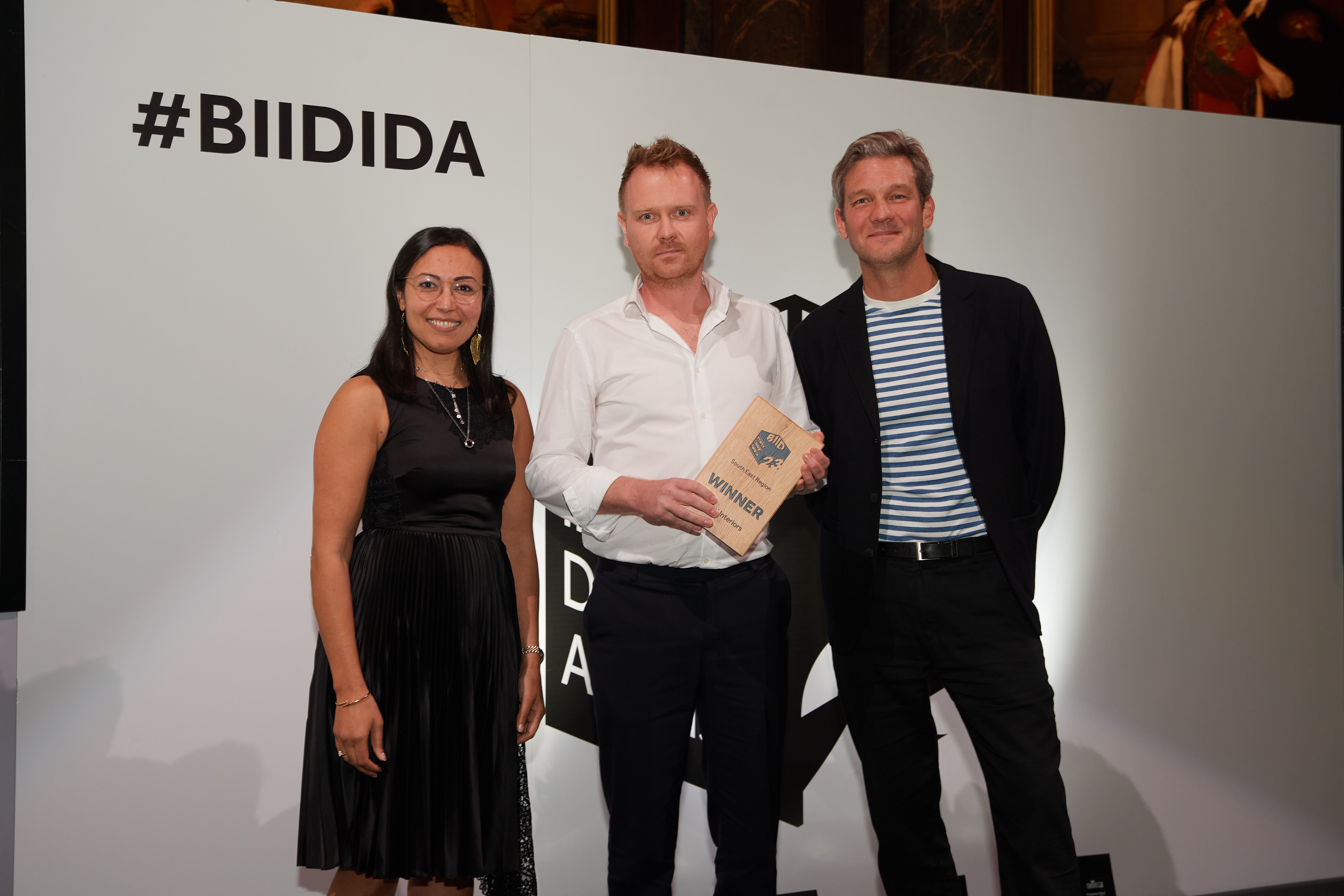 Three winners with their award