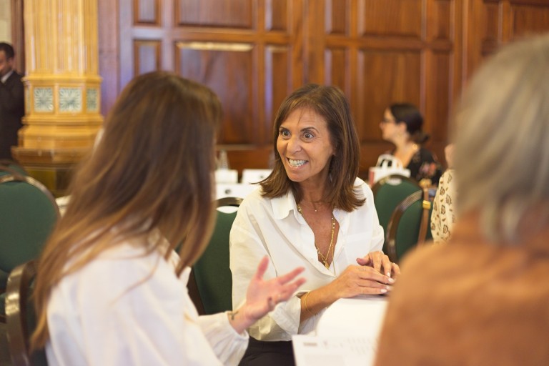 People smiling at conference