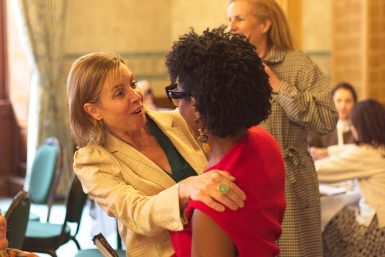 People hugging at event