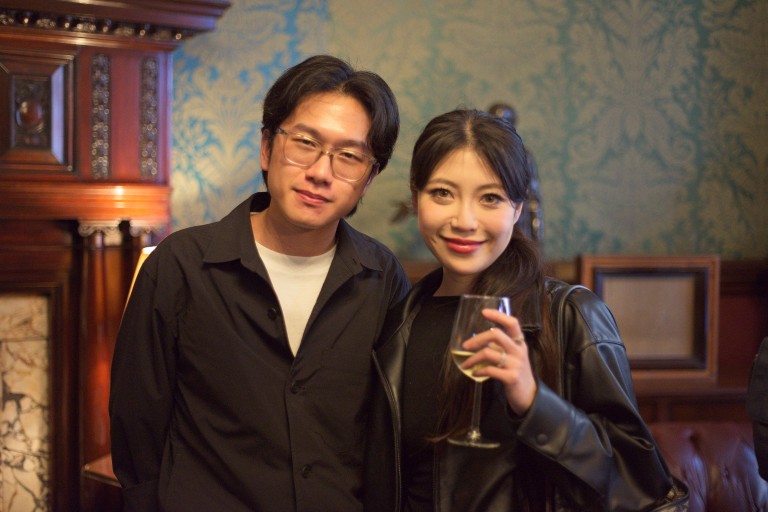 People attending drinks reception