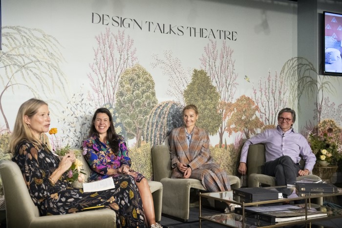 four people giving a design talk