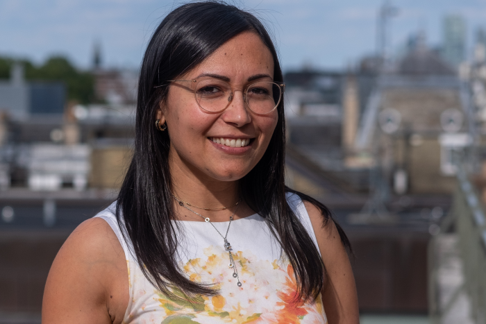 smiling dark haired woman