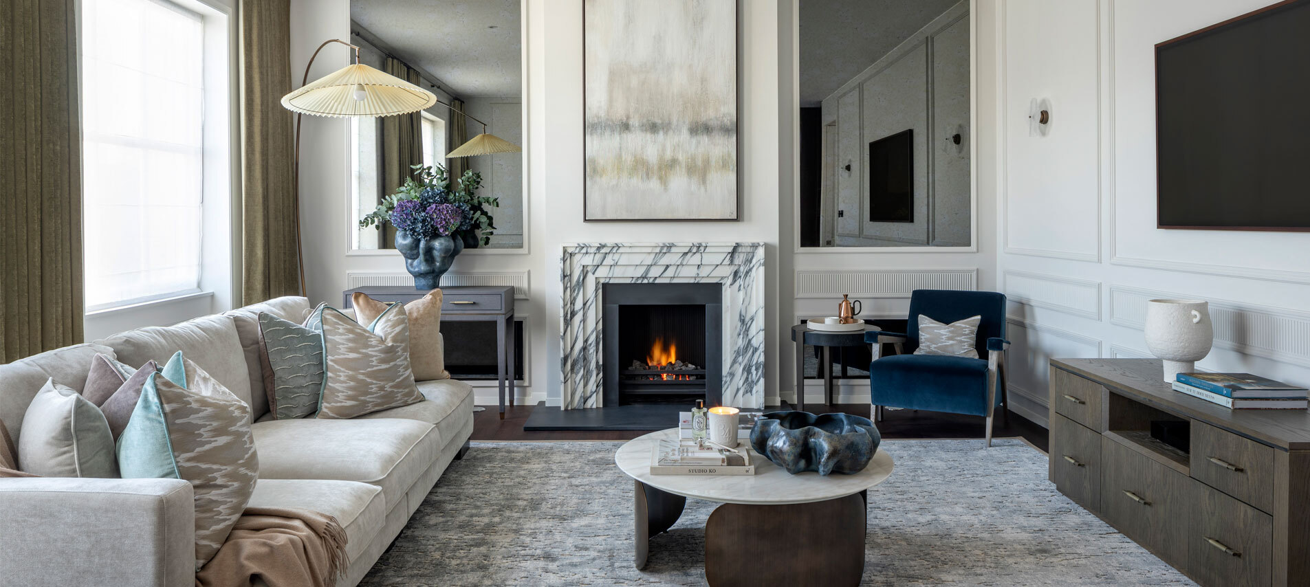 Living room with TV and fireplace