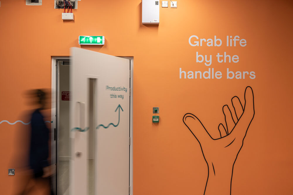 Stairway door with graphic on wall