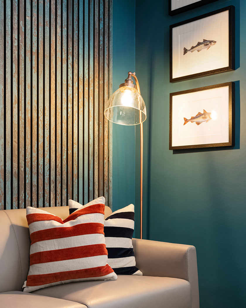 Seating area with lamp and cushions