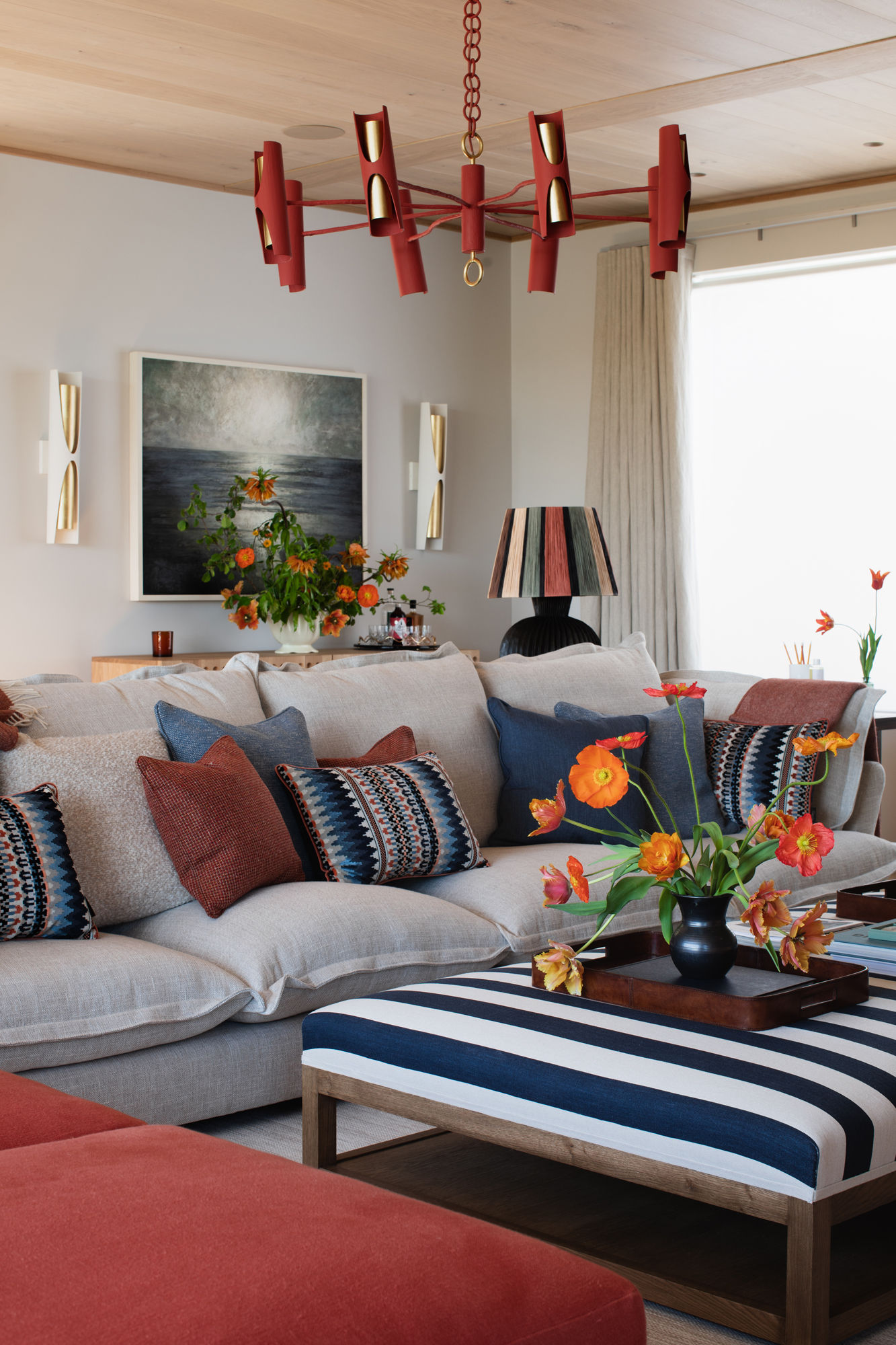 Elegant reception room within a contemporary riverside new build, fully furnished and styled as part of a high-end, turnkey interior architecture project with layered lighting and bespoke finishes.