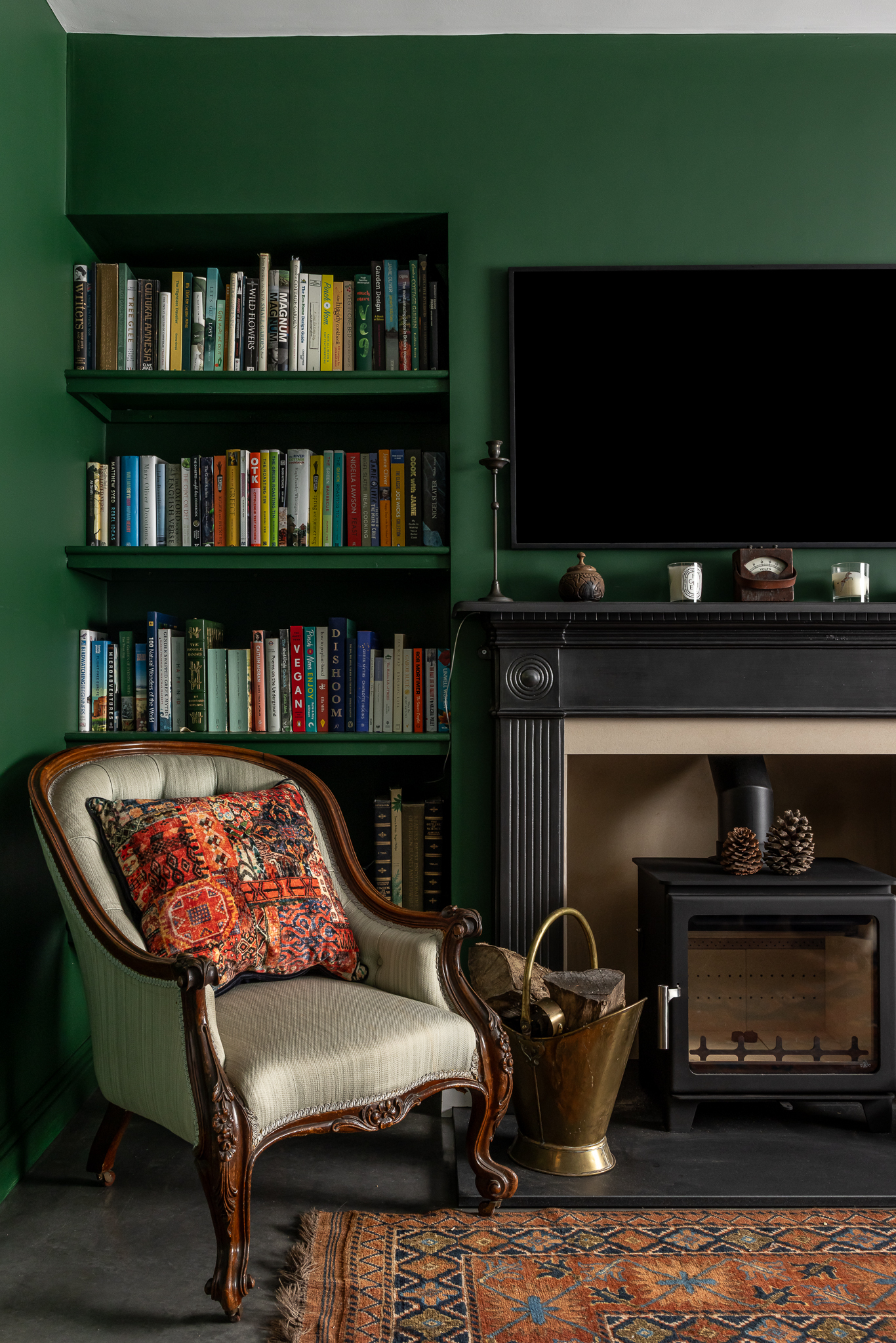 Snug including Little Greene paint, reupholstered chair and new bookcase