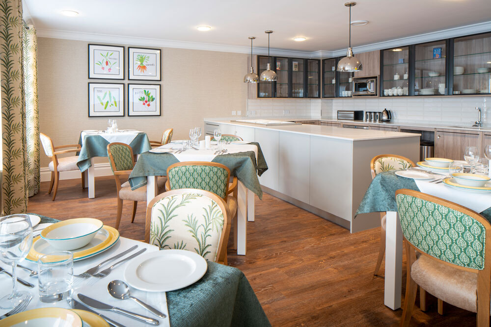 Kitchen area with tables and chairs