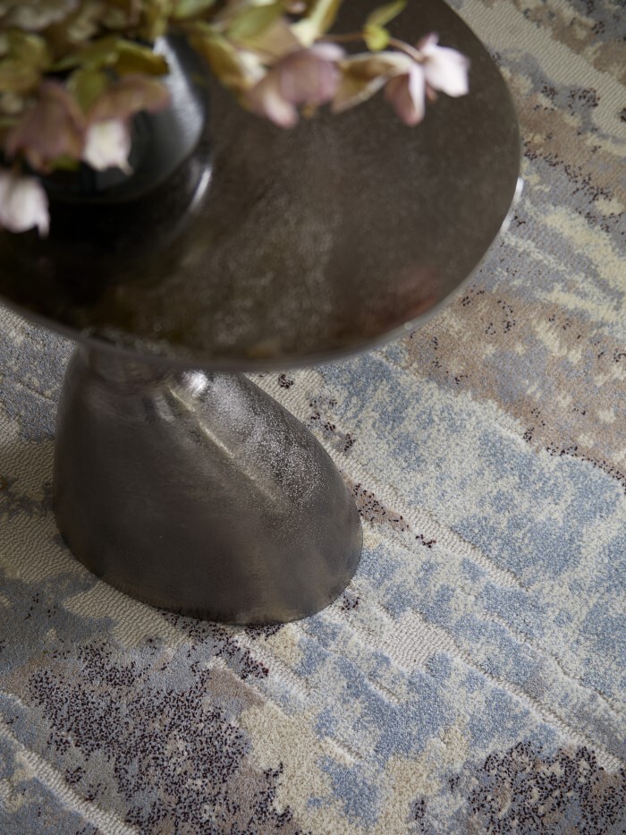Close up of side table on rug