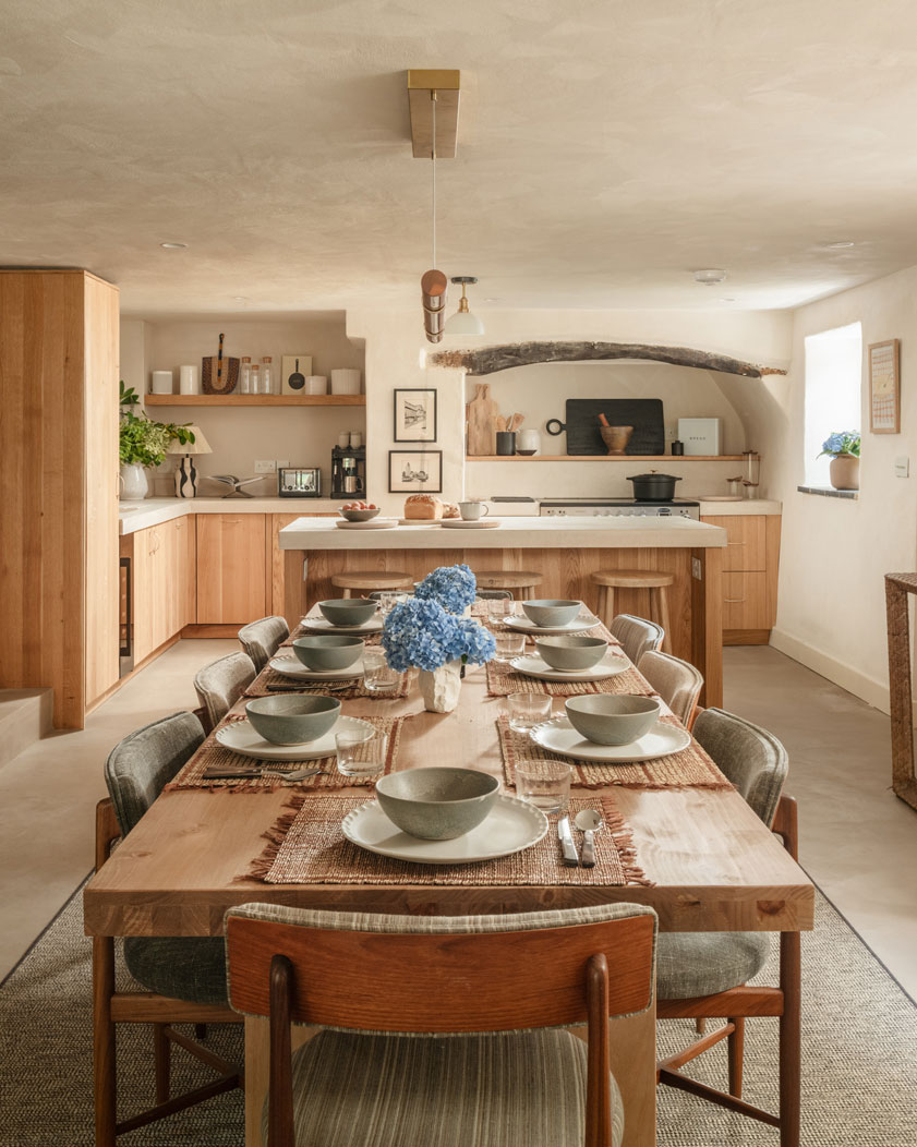 Kitchen table with place settings.