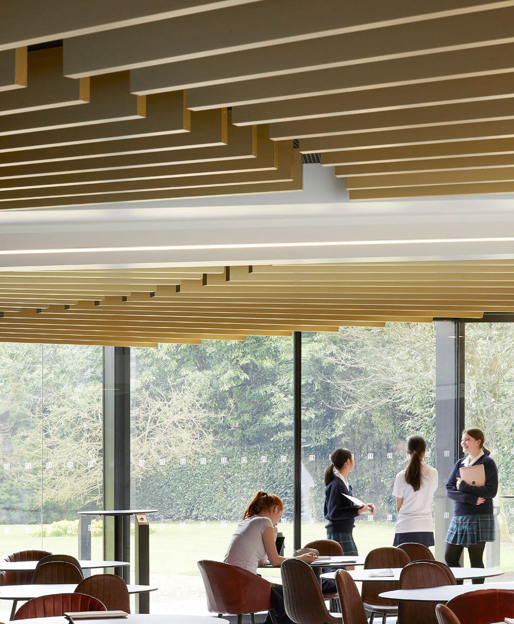 Inside of building with people talking