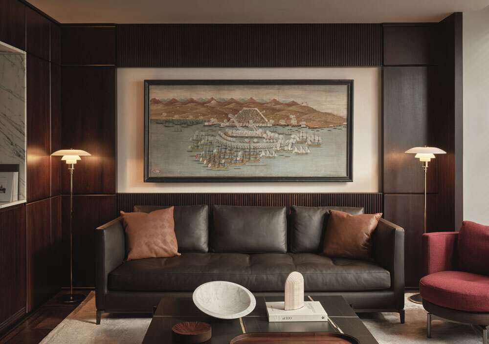 Sofa below artwork in office