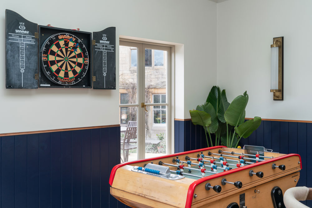 Games area with darts and foosball