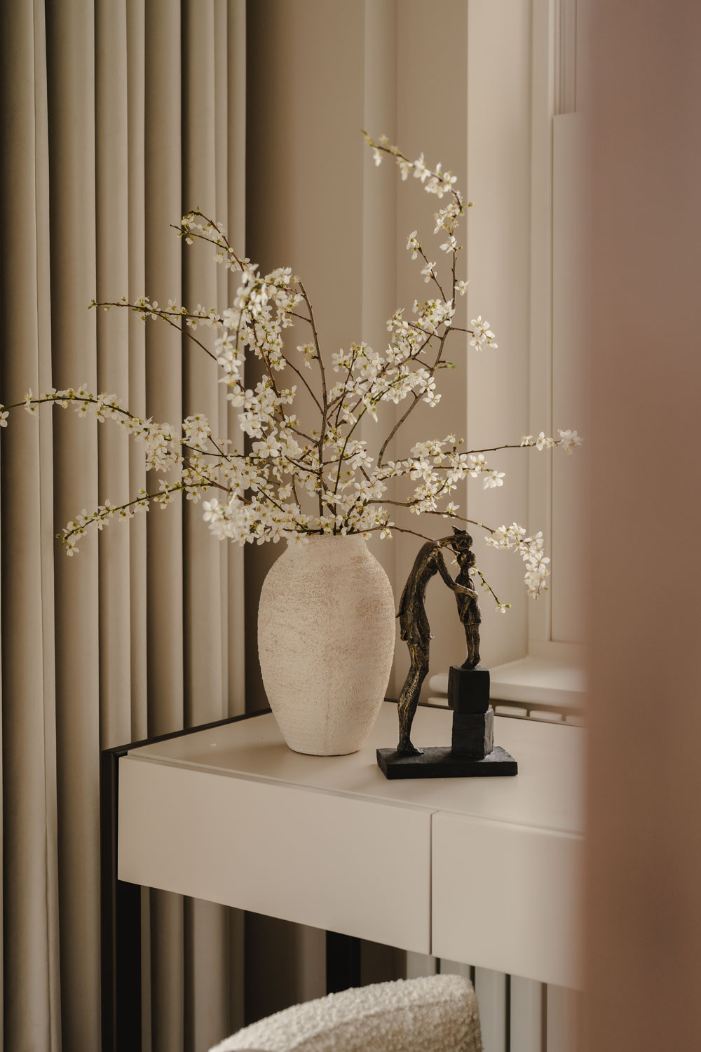 Flowers and a small statue