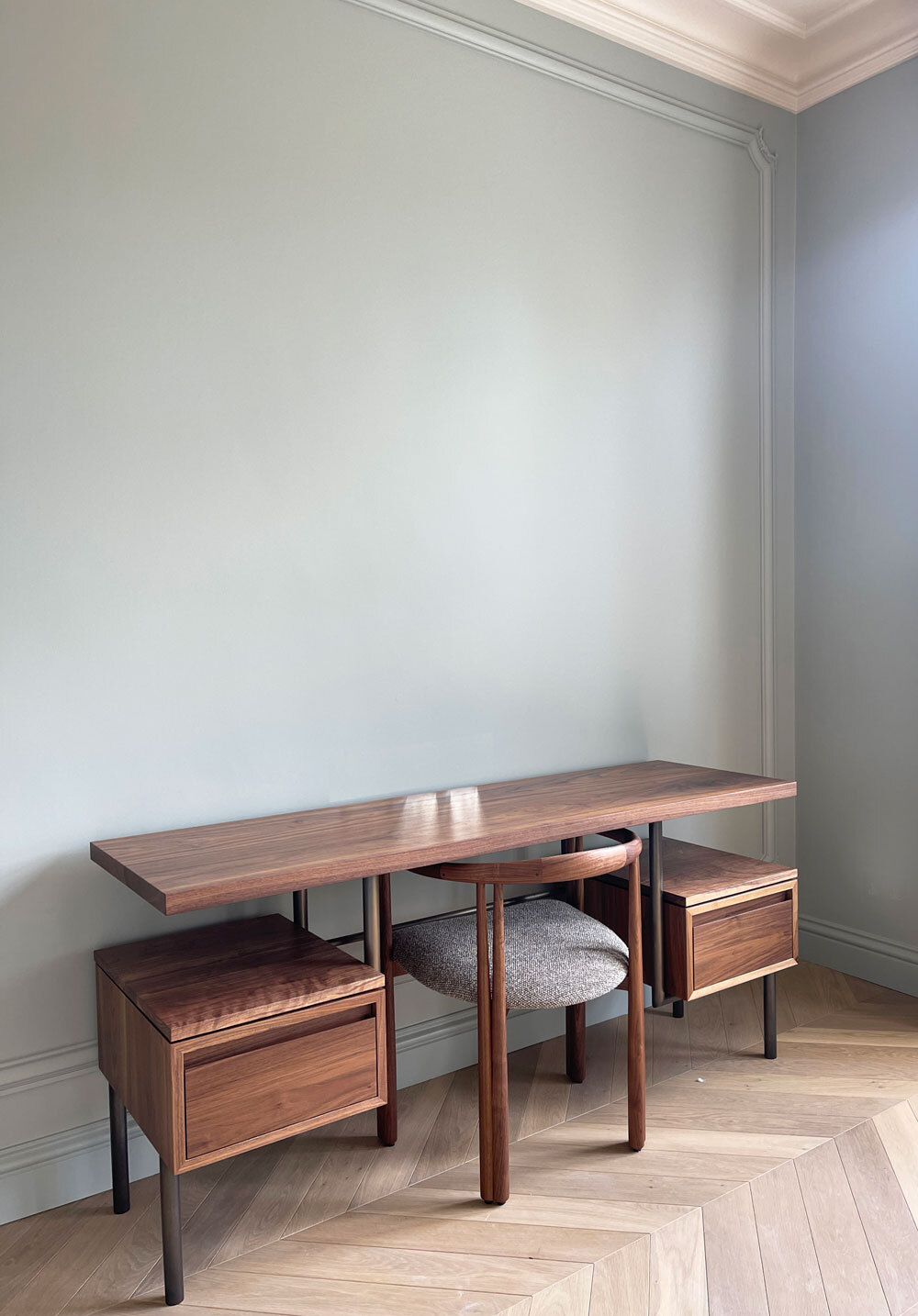 Wooden desk against wall