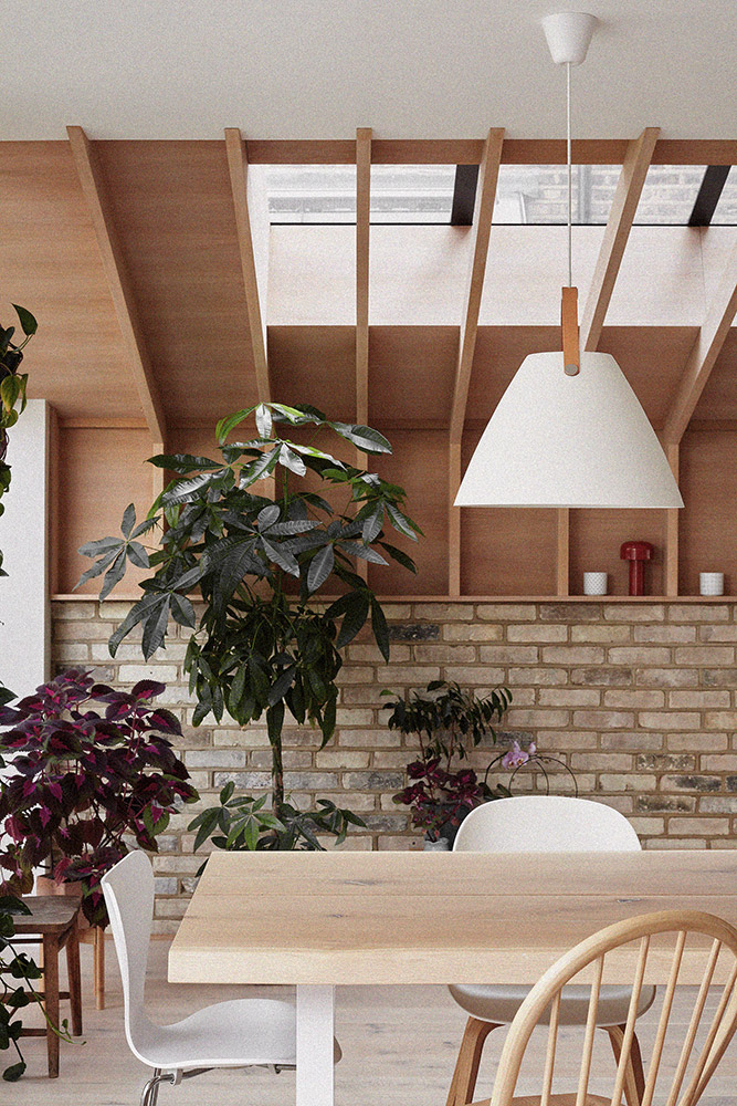A Scandi-inspired kitchen with Scandinavian-inspired dining area within the new extension