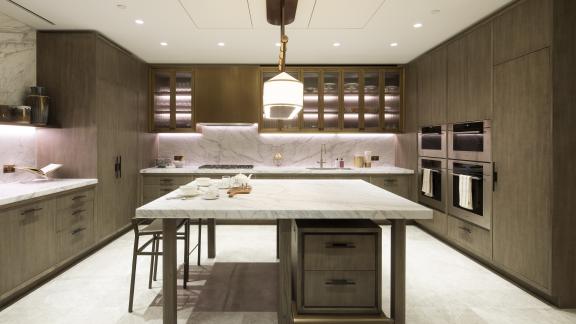 Large kitchen table in a grey kitchen